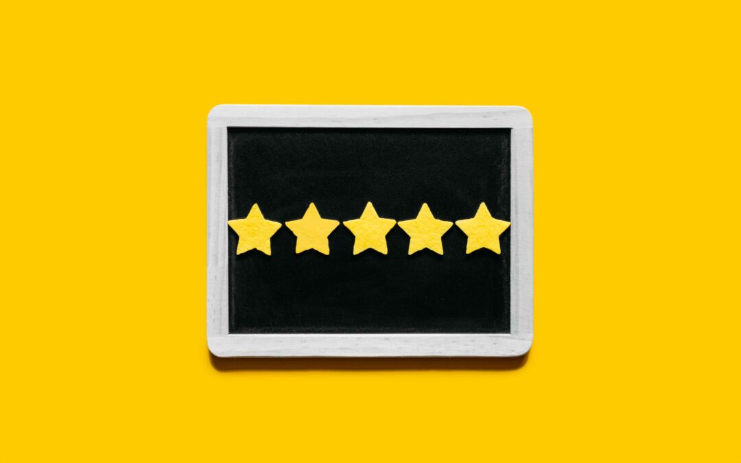 graphic with yellow background and 5 stars laid on black background to symbolize reviews